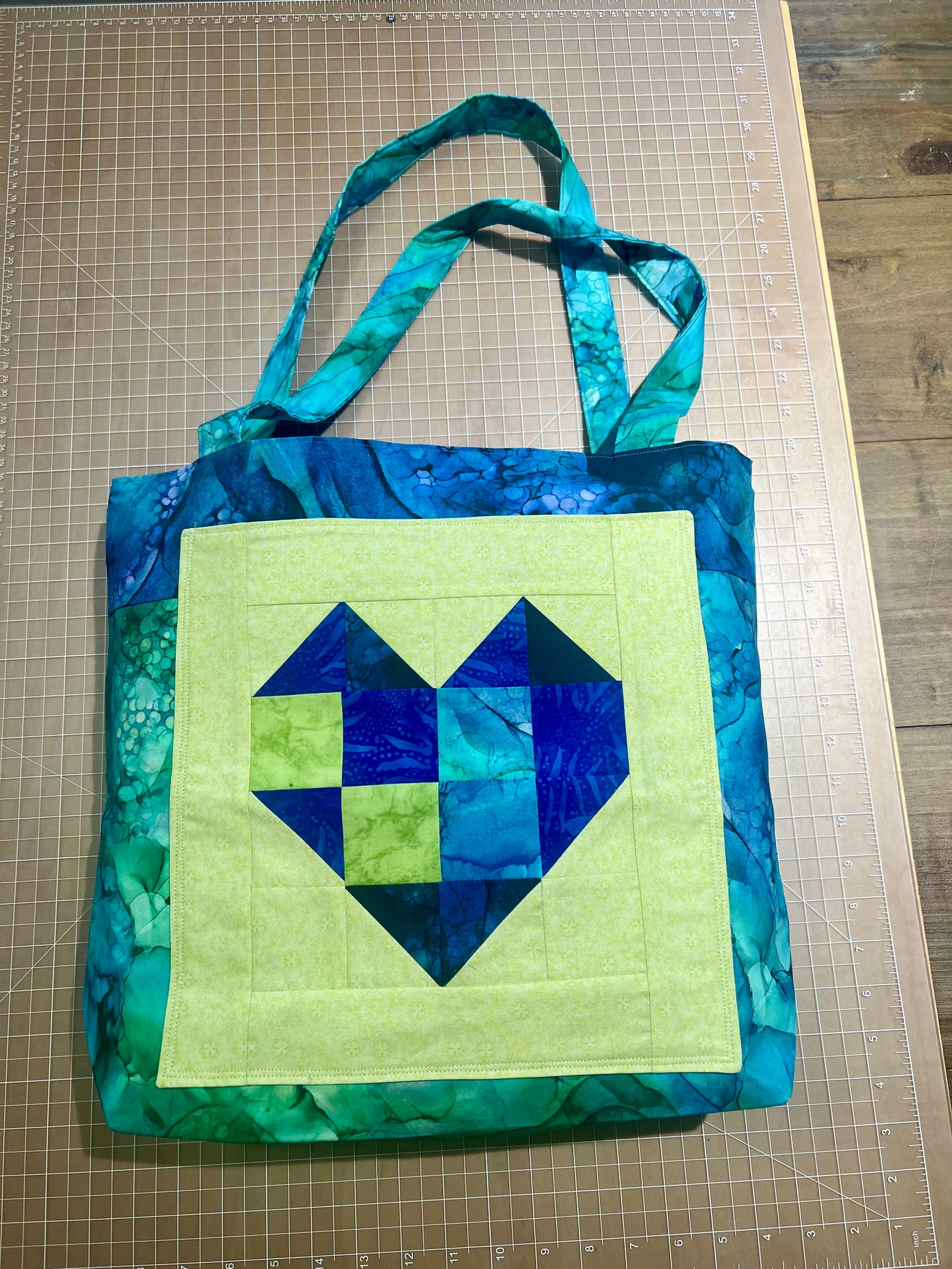 Quilted Tote Bag; Outer pocket; Available in Blue/Green, Blue/Tan, Dallas Cowboys; 14" x 12"