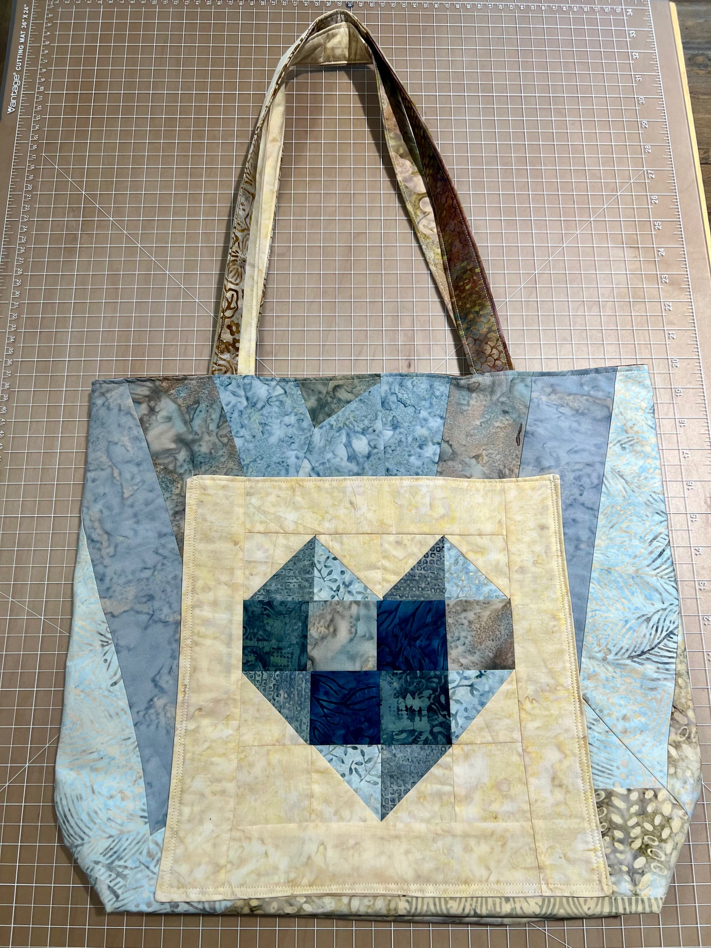 Quilted Tote Bag; Outer pocket; Available in Blue/Green, Blue/Tan, Dallas Cowboys; 14" x 12"