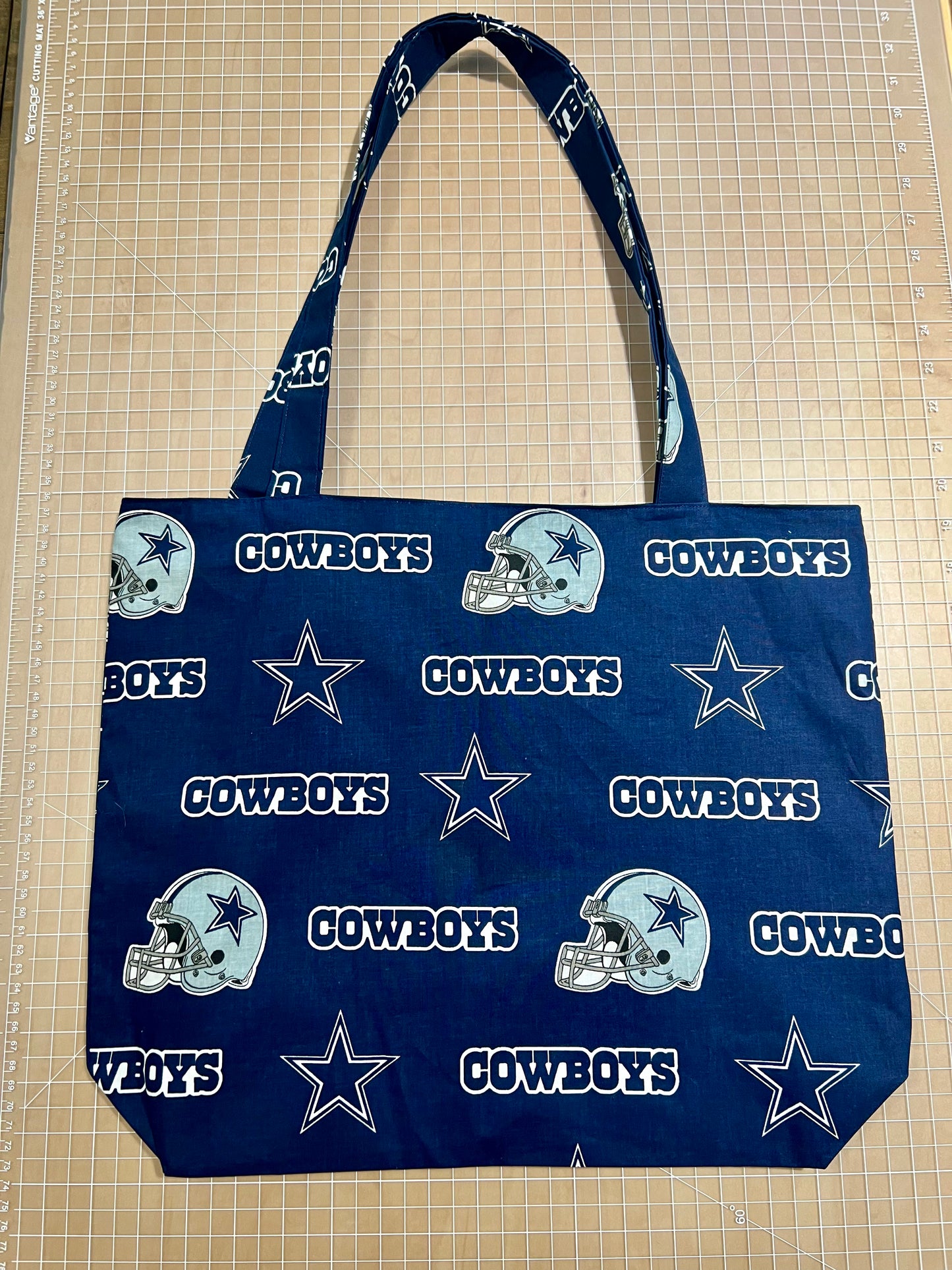 Quilted Tote Bag; Outer pocket; Available in Blue/Green, Blue/Tan, Dallas Cowboys; 14" x 12"